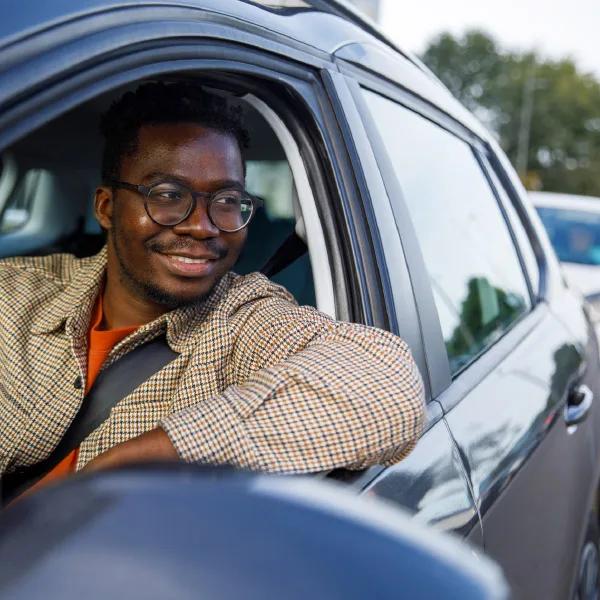 A happy man driving